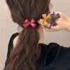 THREE-DIMENSIONAL BOW CUFF PONY